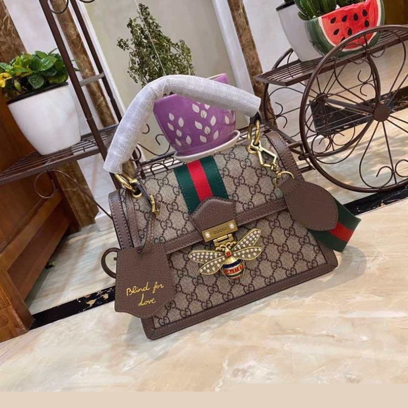 G*u*i top handle bags